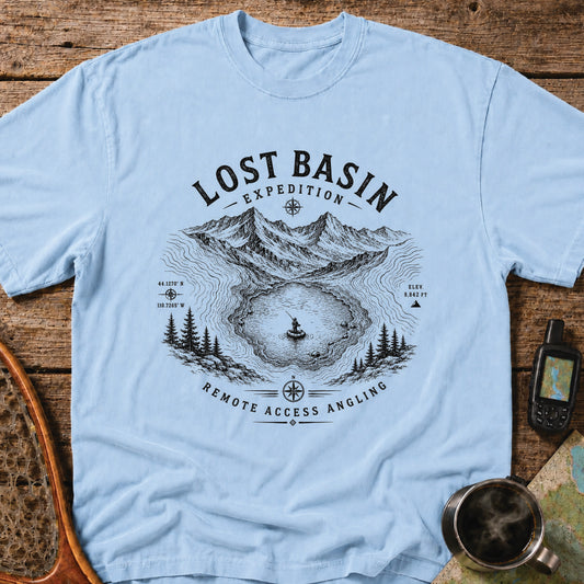 Packrafter fishing in a hidden alpine basin surrounded by mountain peaks and contour lines.
