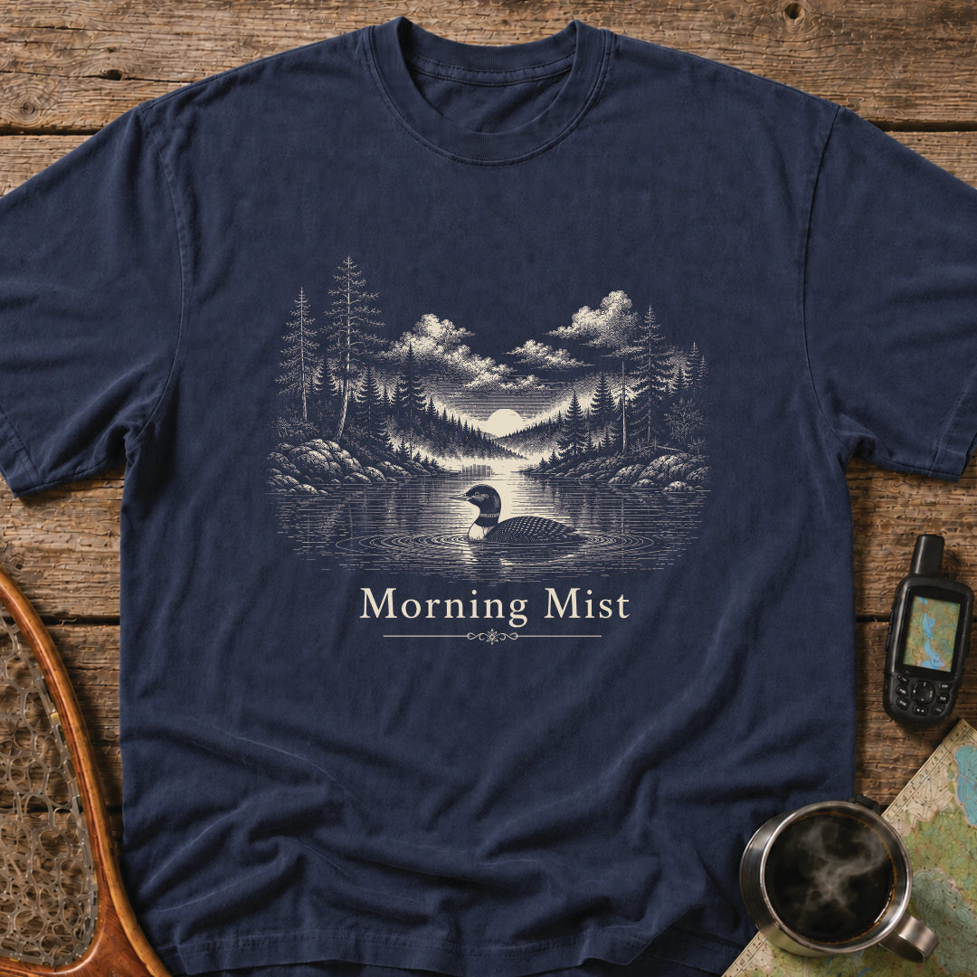 Morning Mist t-shirt featuring a loon swimming across a calm lake at sunrise.