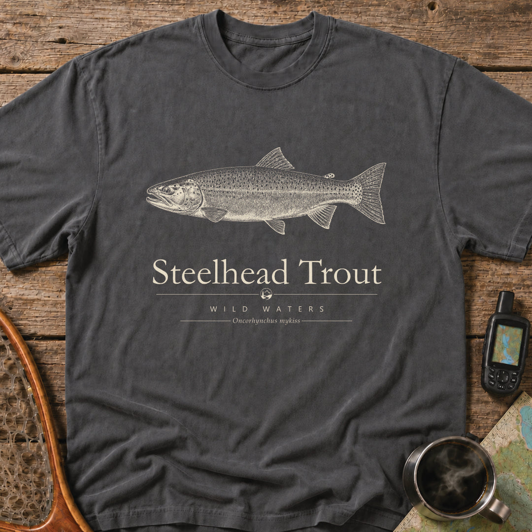 Pepper Comfort Colors T-shirt featuring a vintage cream steelhead trout illustration, Wild Waters typography, and the scientific name Oncorhynchus mykiss.