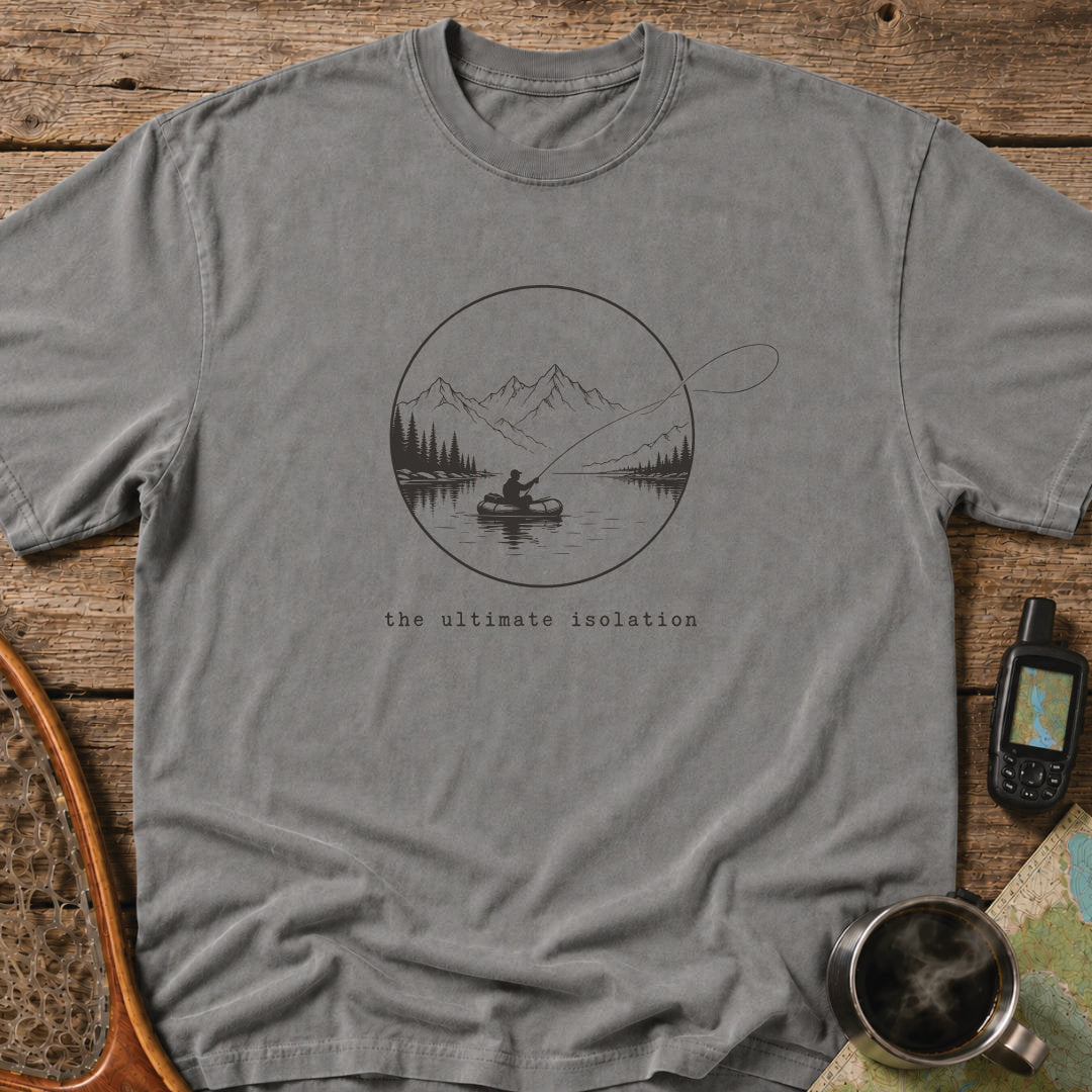 The Ultimate Isolation t-shirt featuring a lone angler casting from a packraft on a mountain lake.